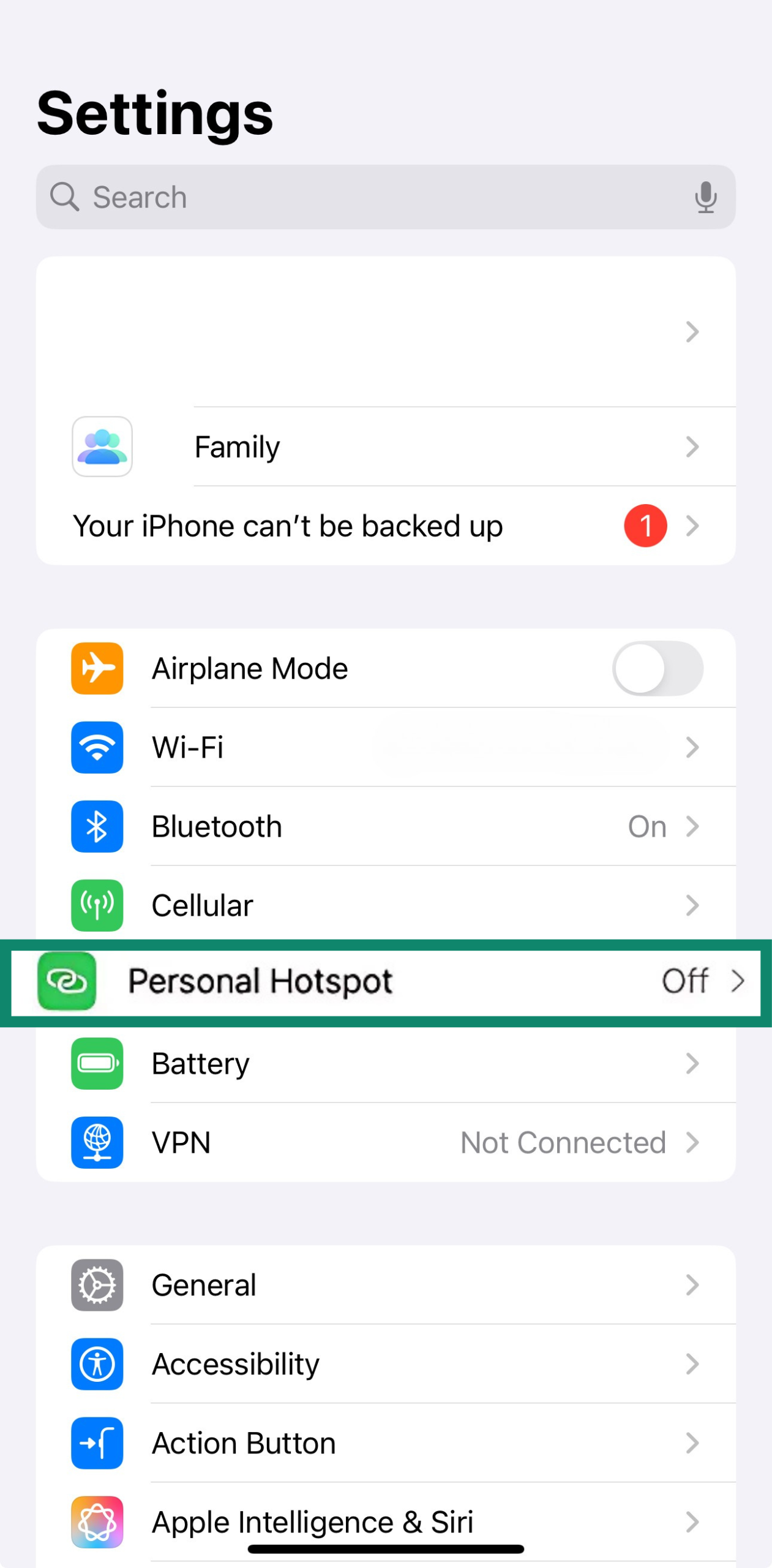 iPhone settings menu with Personal Hotspot highlighted.