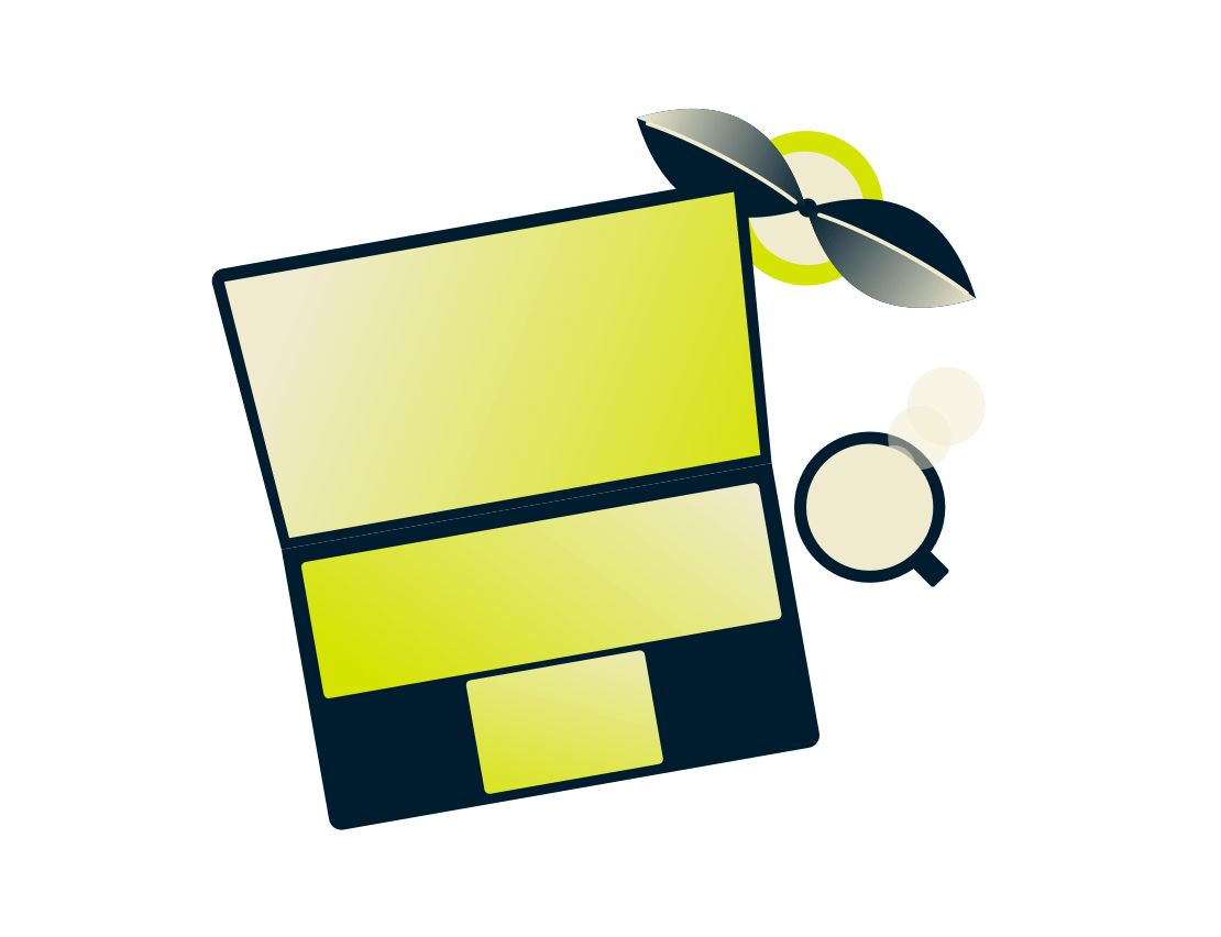 Ноутбук із рослиною та напоєм.